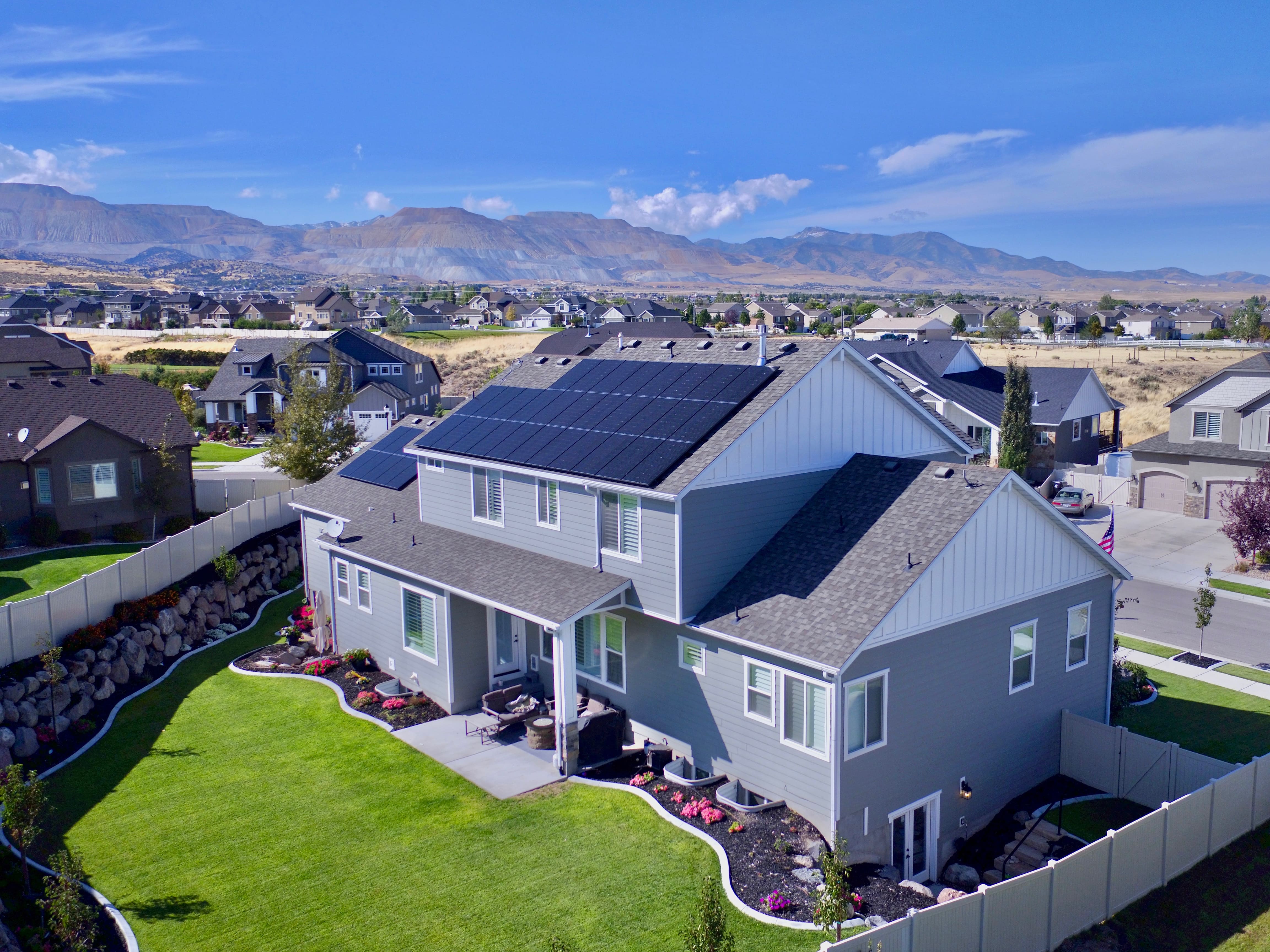 A home in Utah with solar panals installed on the roof.